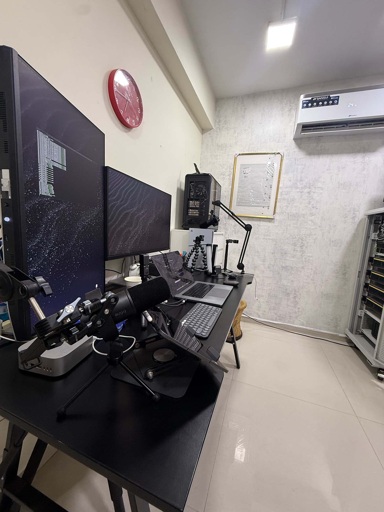 Workstation with dual monitors and server rack